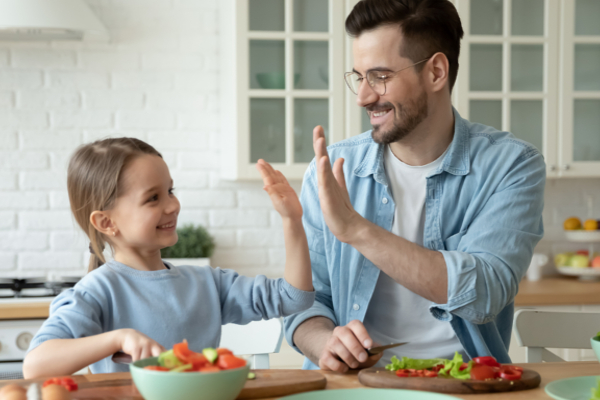 father and daughter in the kitchen