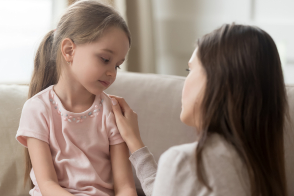 mother talking to upset child